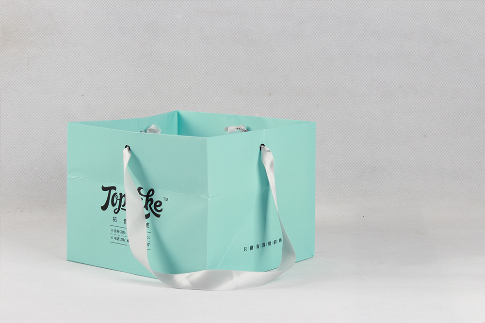 薄荷綠清新型白卡紙袋 拓普凱克